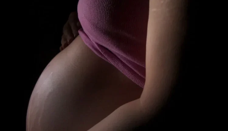 woman in pink panty and bra