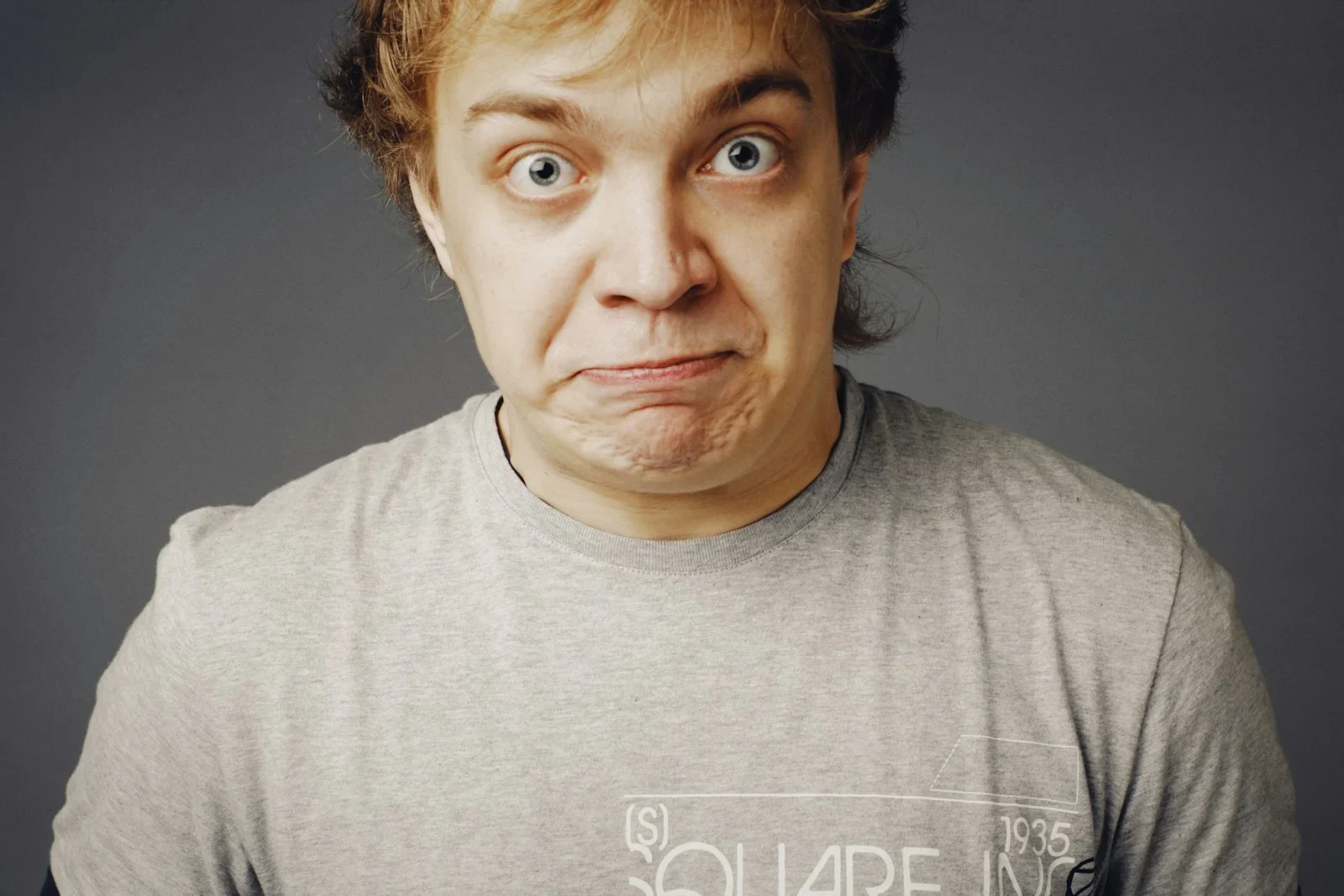 a man with a surprised look on his face