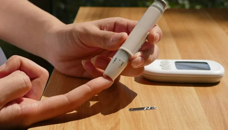 a person sitting at a table with a cell phone
